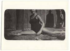 Original 1940s swimsuit lady doing split