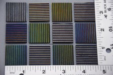 0100.43-12 PIECES- 1"x 1" IRIDIZED REED TEXTURE THIN BLACK BULLSEYE GLASS 90 COE