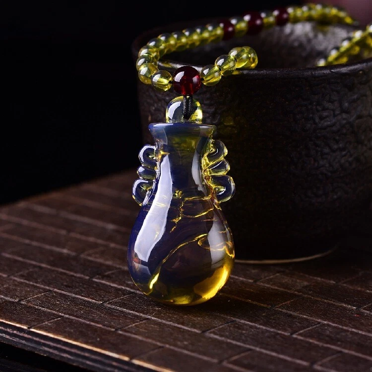 Collar colgante botella ámbar natural flor cera de abejas azul ámbar joyería Foto 4 de 4