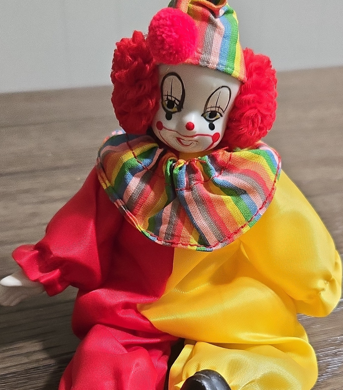 Porcelain Clown Doll with Red Yellow Outfit, Rainbow Hat, Collectible Decor