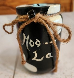 VTG Hand Painted Black and White Glass Jar Bank Moo La Cow Theme Bell