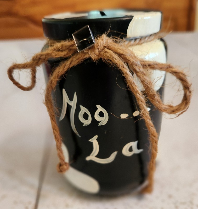 VTG Hand Painted Black and White Glass Jar Bank Moo La Cow Theme Bell