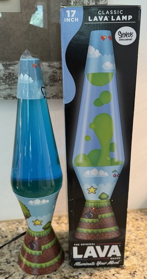 A Schylling lava lamp with 8-bit pixel graphics on the globe — retro gaming meets retro decor in one surprisingly clever mash-up.