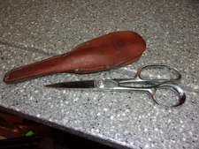 H53  Case XX shears in leather sheath