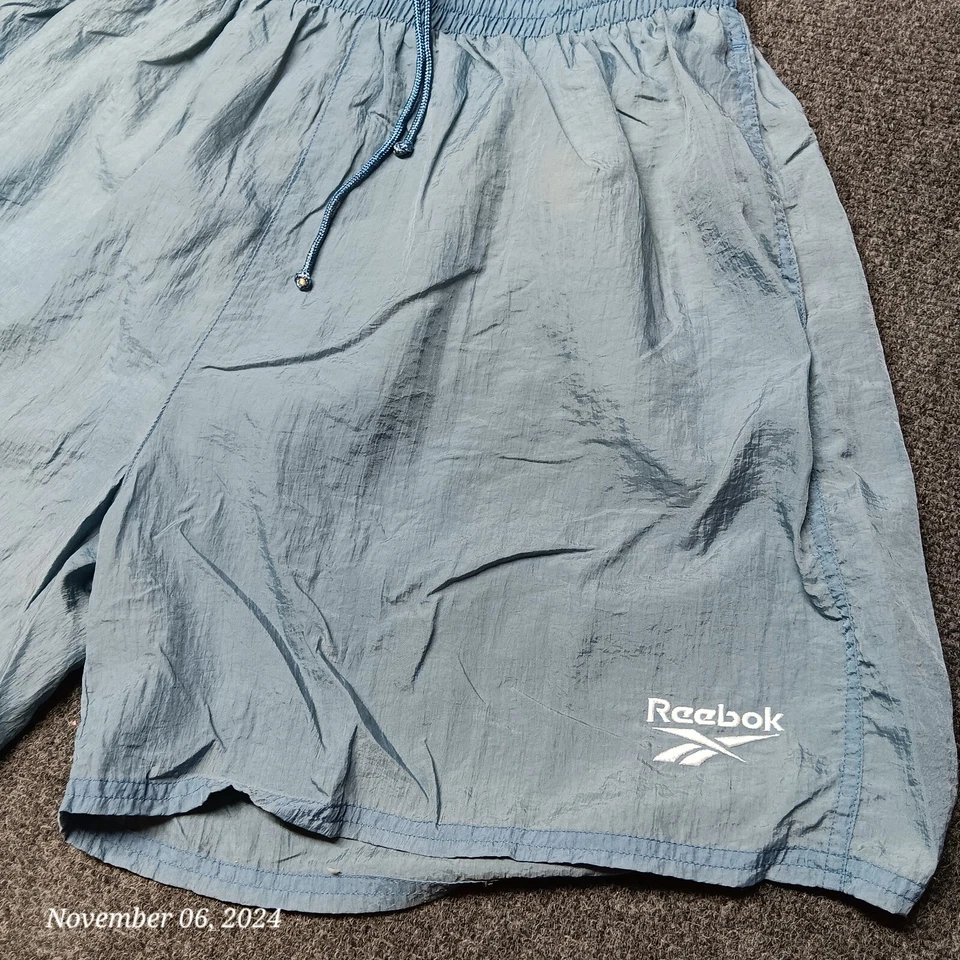 Bañador corto Reebok vintage para hombre XL azul desteñido malla forrado Foto 2 de 4
