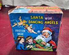 VTG SANTA WITH DANCING ANGELS FRICTION DRIVE TOY HONG KONG BOX Santa Claus