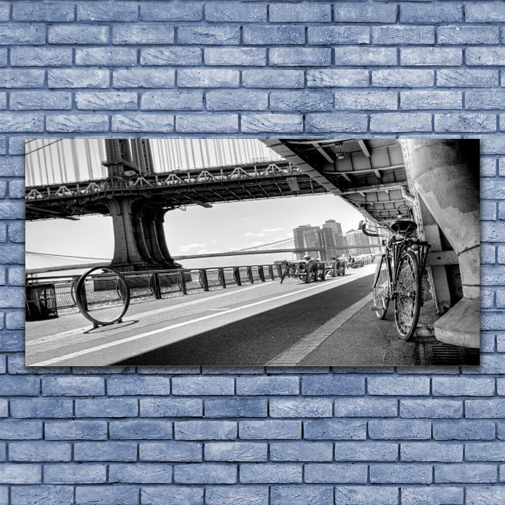 Architecture et vélo sur un pont : grand tableau en verre 140x70 pour salon moderne