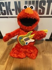 Sesame Street Rock and Rhyme Elmo Talking, Singing 14-Inch Plush Toy for Toddler