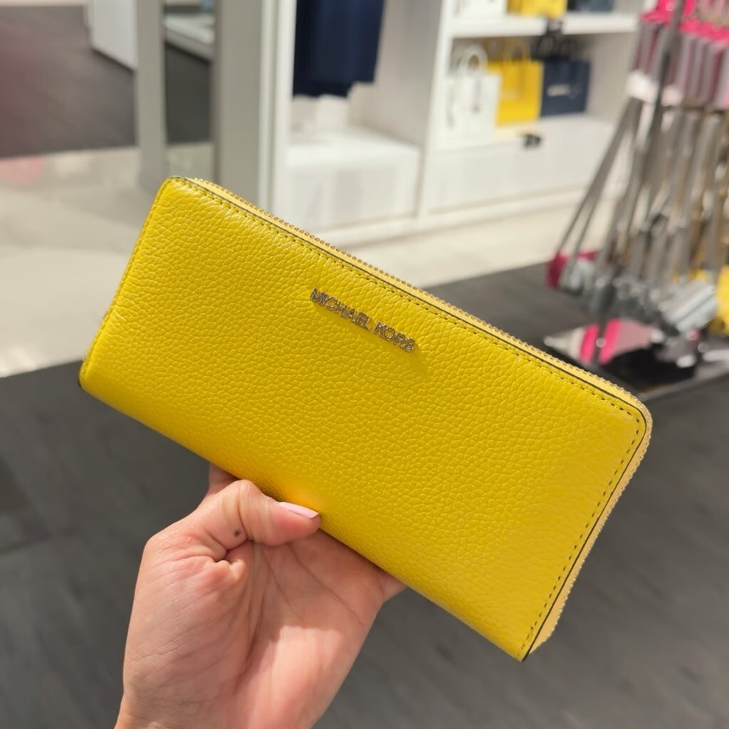 【即発】マイケルコース JET SET TRAVEL MD WLLET DAISY YELLOW Michael Kors Jet Set Travel Leather Continental Wristlet