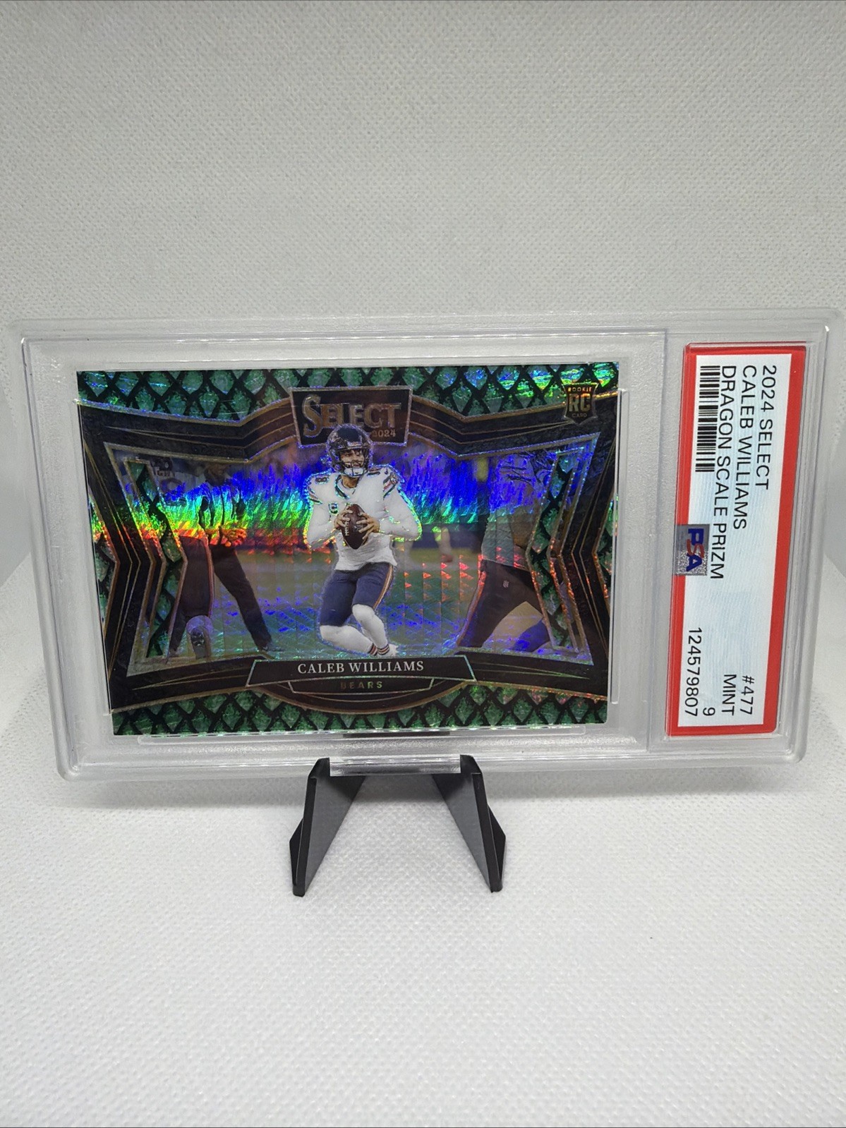 2024 Panini Select - Field Level Caleb Williams #477 Dragon Scale Prizm /70 (RC)