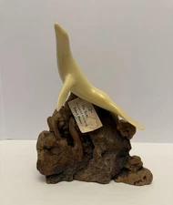 Vintage 1980 John Perry 10.5” Tall Seal Sculpture Figurine Burlwood Base.