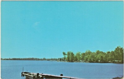 1967 View of Motor Boat Docked on Enchanting Fremont Lake in Fremont,  Michigan