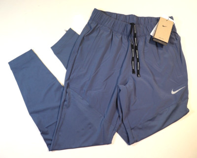 NIKE DRI FIT ESSENTIAL RUNNING STRETCH WOVEN PANTS - BLUE DH6975-491 - WOMEN S