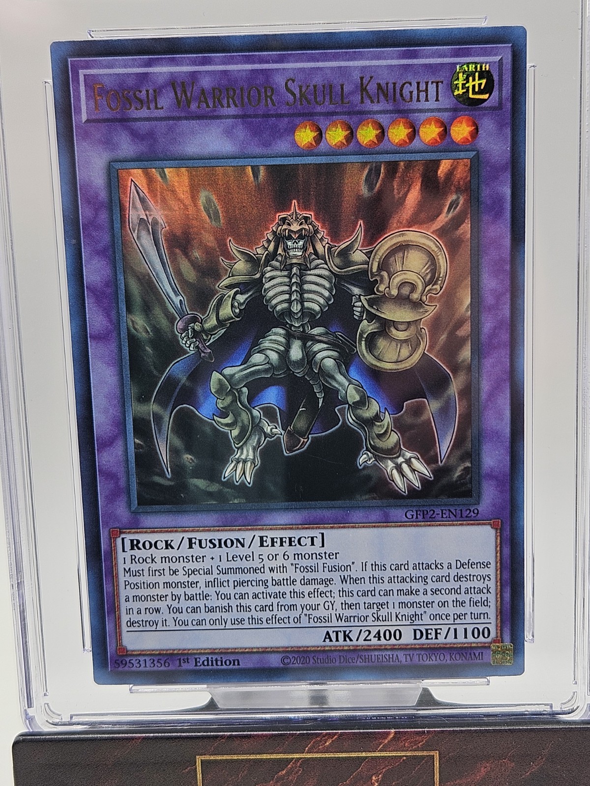 Konami CGC 8.5 Fossil Warrior Skull Knight GFP2-EN129 1st Ed Ultra Rare GHOST view 2