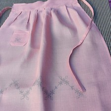 Vintage stamped embroidery pattern on PINK APRON