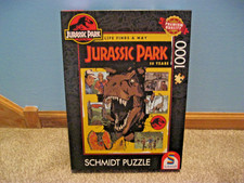 SCHMIDT 1000 PIECE PUZZLE 30 YEARS OF JURASSIC PARK: LIFE FINDS A WAY CHECK OUT 