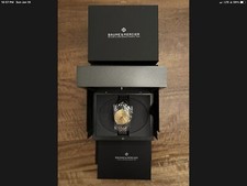 Baume & Mercier Clifton Men's Watch 18K Solid Gold Bezel MOA10352. MRSP $4,800 3