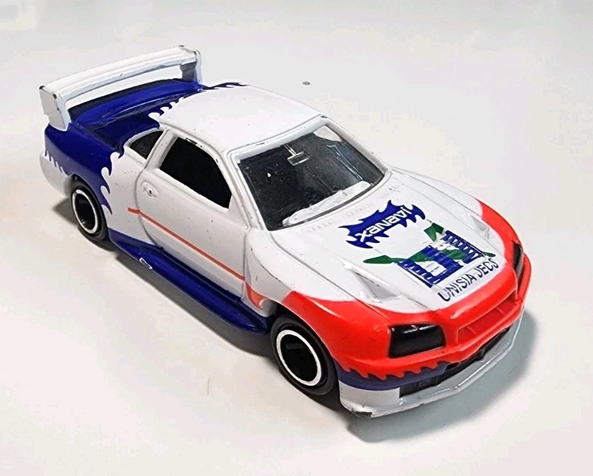 Tomy Tomica #40 Xanavi Unisia Jecs Nissan Skyline GT-R R34 1/61