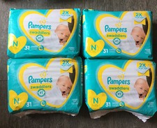 4 Pampers Swaddlers Newborn diapers 31ct packages 124 count total