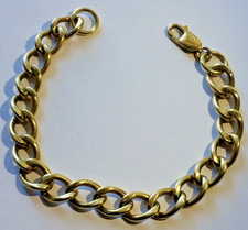 9CT GOLD CURB LINK BRACELET. 20.1/2,CM LONG, (LONDON 1975) 28.25 GRAMS,
