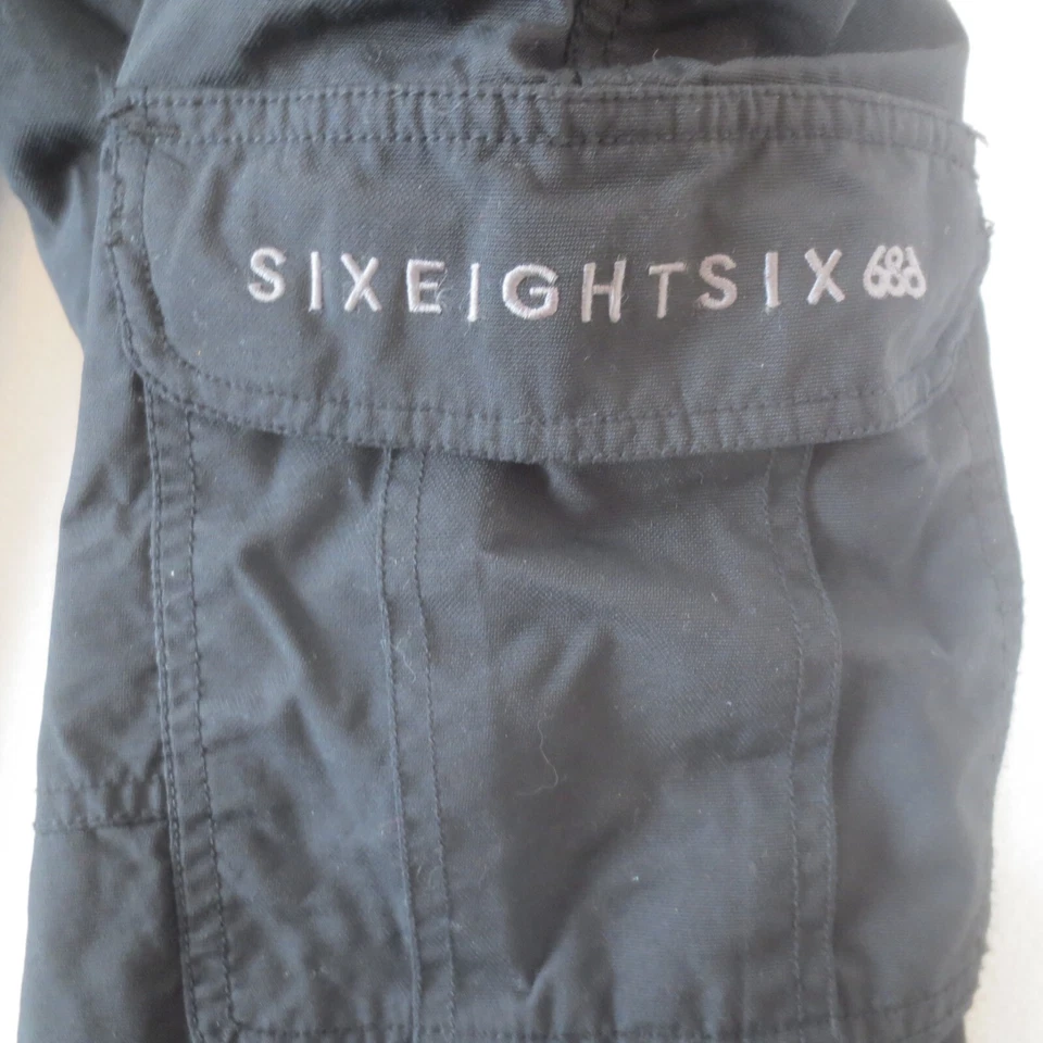 Pantalones de snowboard 686 Mannual Ridge aislados jóvenes niños medianos negros esquí invierno Foto 3 de 4