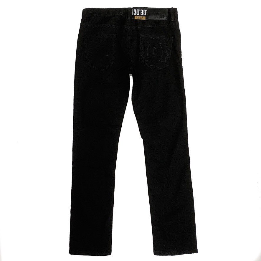 Jeans DC Shoes Noir Brodé – Taille W36 L34 – Coupe Loose Stretch – Occasion Très Bon État
