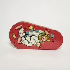 Tin Lithographed Dancing Clown Noisemaker Toy with Wooden Handle