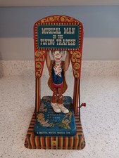 vintage man on the flying trapeze tin toy (wo...