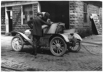 #ad Man putting gasoline in Buick roadster on trip through upstate New YorkNY1909 $12.99