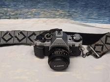 Canon AE-1 35mm SLR Film Camera with Canon 50mm f/1.8 FD Lens - NICE- With Strap