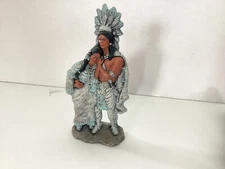 Provisional mold of Native American chief and wife.