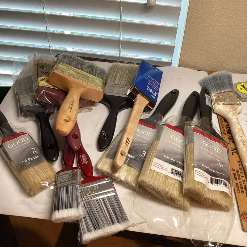 11 Brand New Paint brushes.Quality Brushes 1 1/2 To 4 Inch Wide. One Used