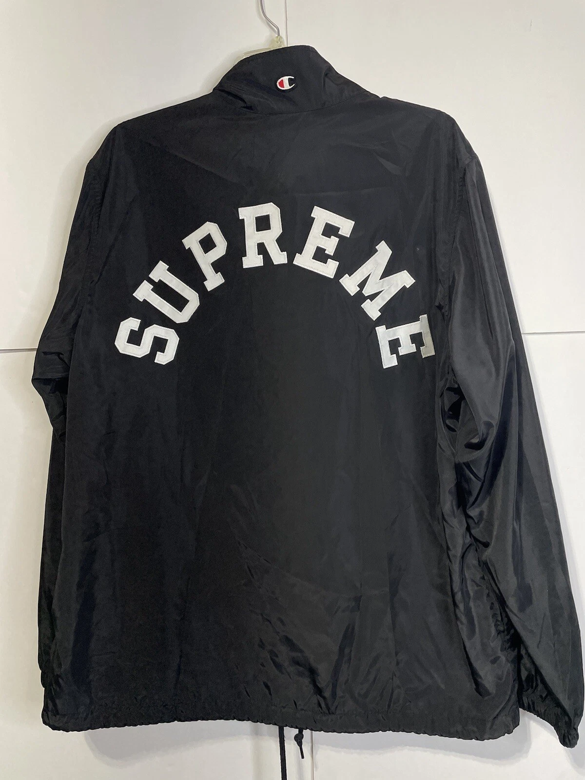 Veste coupe vent Supreme x Champion Coaches 1/4 zip homme grande couture noire