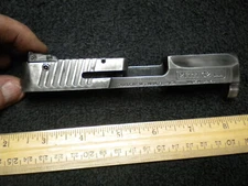 Taurus Millennium PT111 C2 Blued Stripped Slide, has rear sight & loaded Indicat