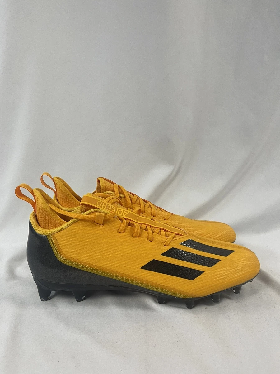black and yellow adidas football cleats