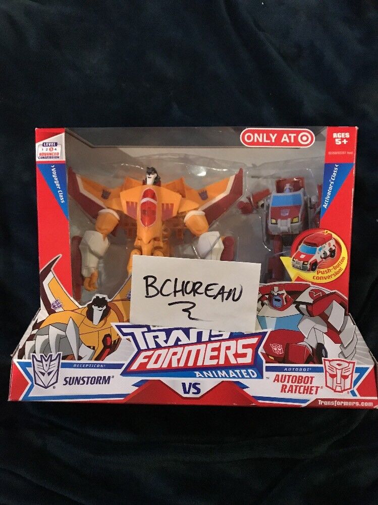 Transformers Animated Sunstorm vs Ratchet - 2-Pack Transformers Animated Sunstorm vs Ratchet - 2-Pack