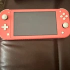 NINTENDO SWITCH LITE - CORAL PINK CONSOLE ONLY *SPARES OR REPAIRS*