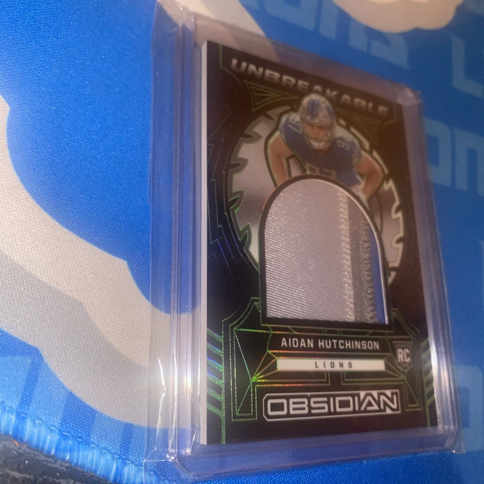 AIDAN HUTCHINSON RC PATCH 2022 OBSIDIAN UNBREAKABLE GREEN /50 LIONS UM-AHU - Image 3 of 4