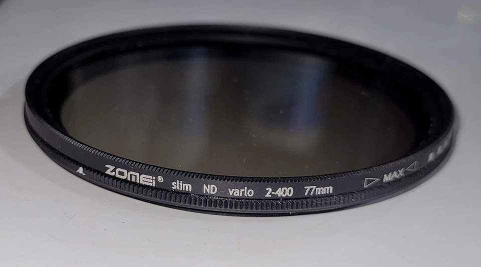 ZOMEI 77mm Adjustable Neutral Density Filter ND2-400 with Two 77mm UV Filters - Image 2 of 4
