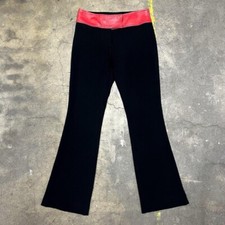 1990s Dolce & Gabbana stretchy knit black flare pants w red waist band size IT42