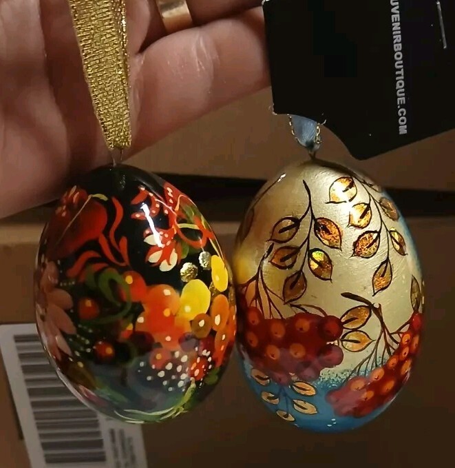 2  wooden hand painted eggs  Souvenier Boutique