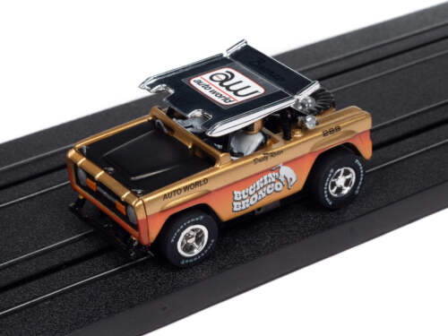 Auto World Xtraction SC407-1A 1972 Ford Baja Bronco Gold w/ Orange Race Graphics - Picture 3 of 4