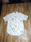 Tommy Bahama's Men's Shirt.  Men's Small.  Unique Beach Pattern 
