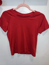 Lululemon Ladies Swiftly Tech, Dark Red. Short Sleeve, Waist Length, Size 8