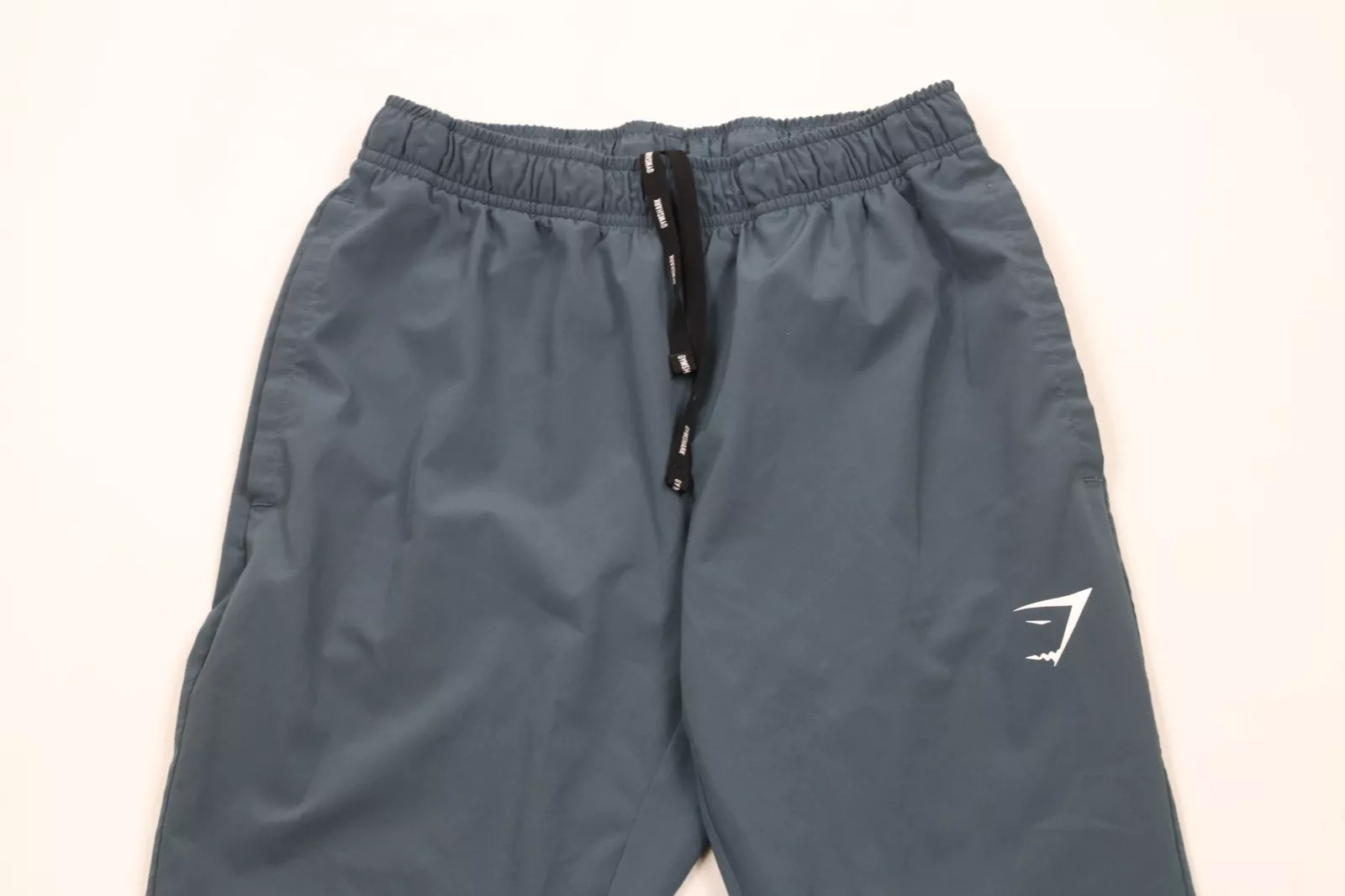 gymshark faded gym tapered leg arrival woven pants