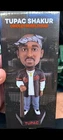 New ListingBALTIMORE ORIOLES TUPAC SHAKUR BOBBLEHEAD SGA 2PAC 5/8/2026 CAMDEN YARDS In Hand
