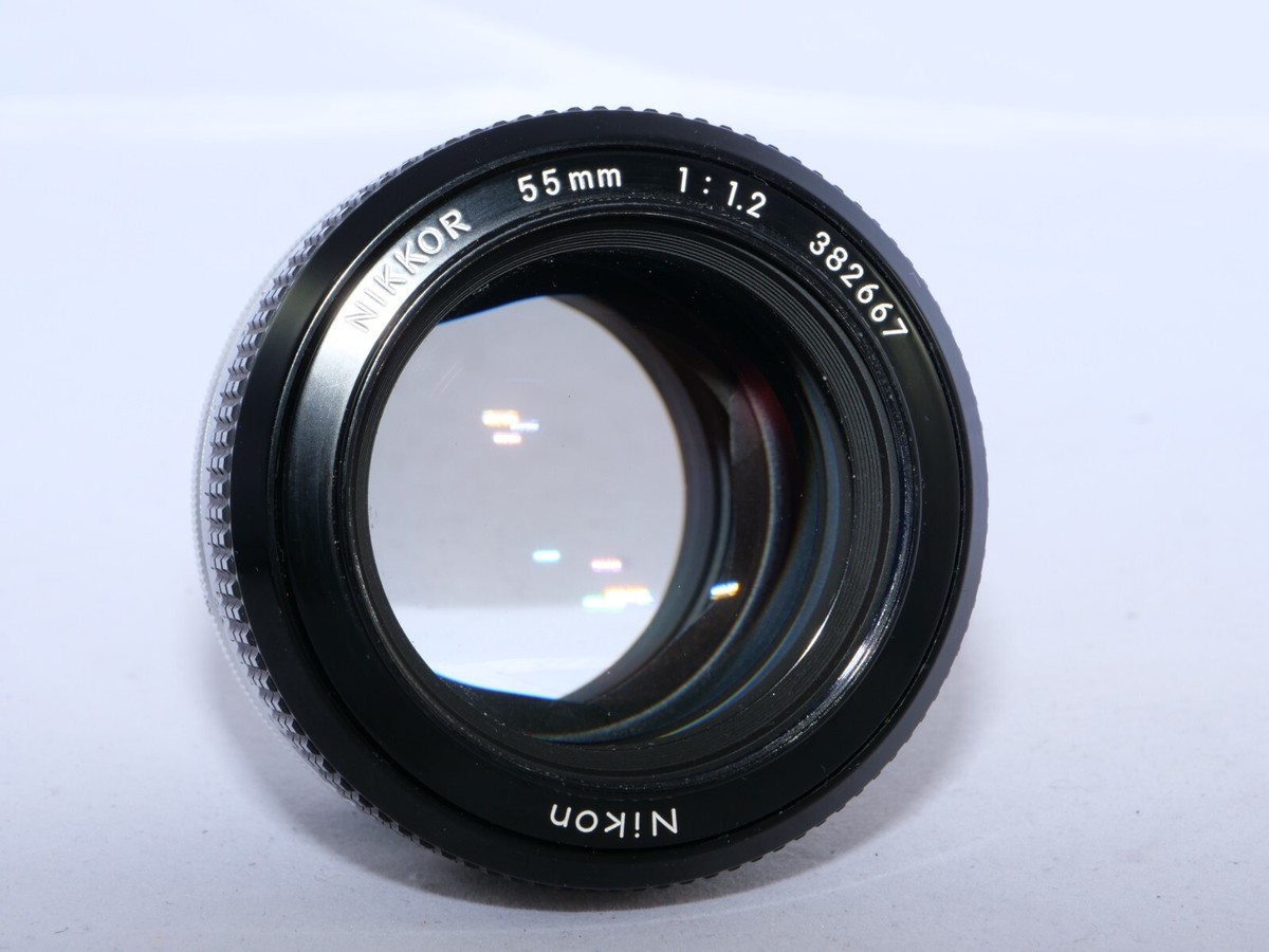 Nikon Nikkor Non Ai 55mm f1.2 FAST lens. Nikon L1Bc filter. Caps