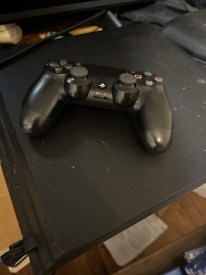 Comes With The Cables, Controller, And Works Completely Fine. Has No Issues