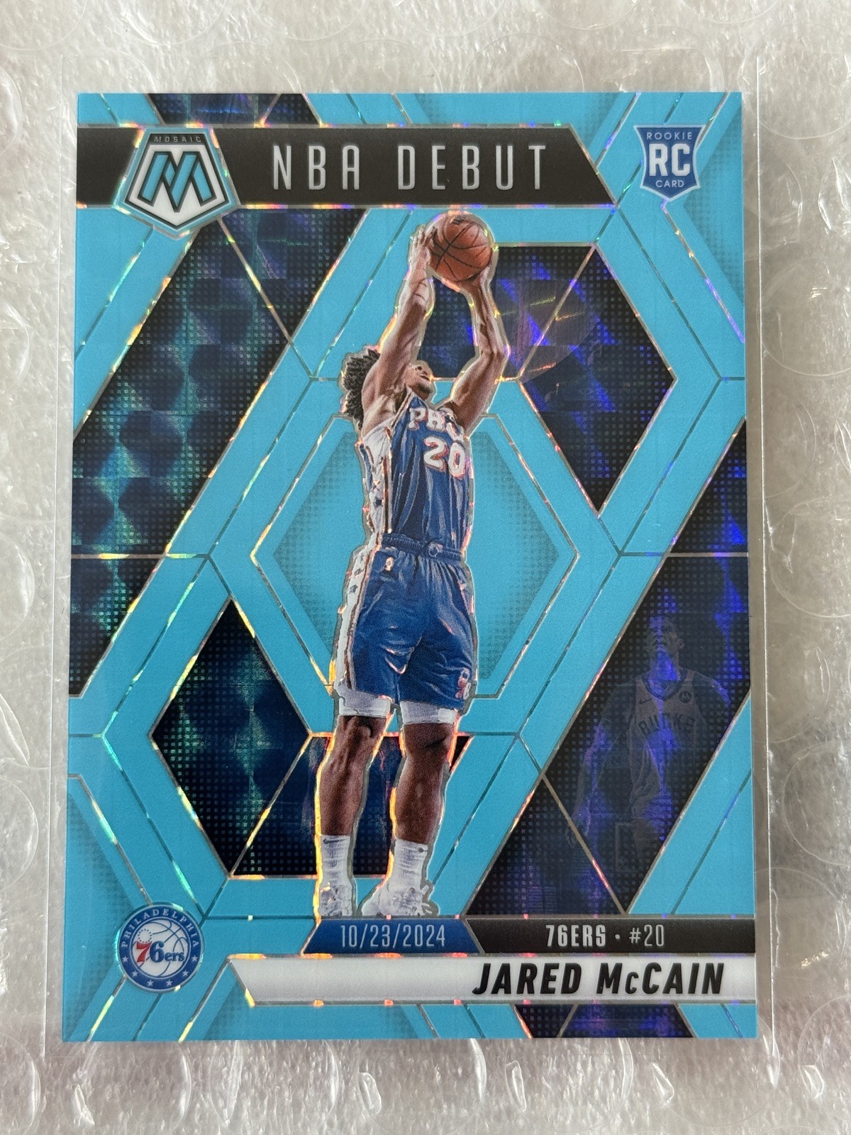 2024-25 Mosaic Panini NBA DEBUT Jared McCain Blue Fluorescent 75/75 BOOKEND