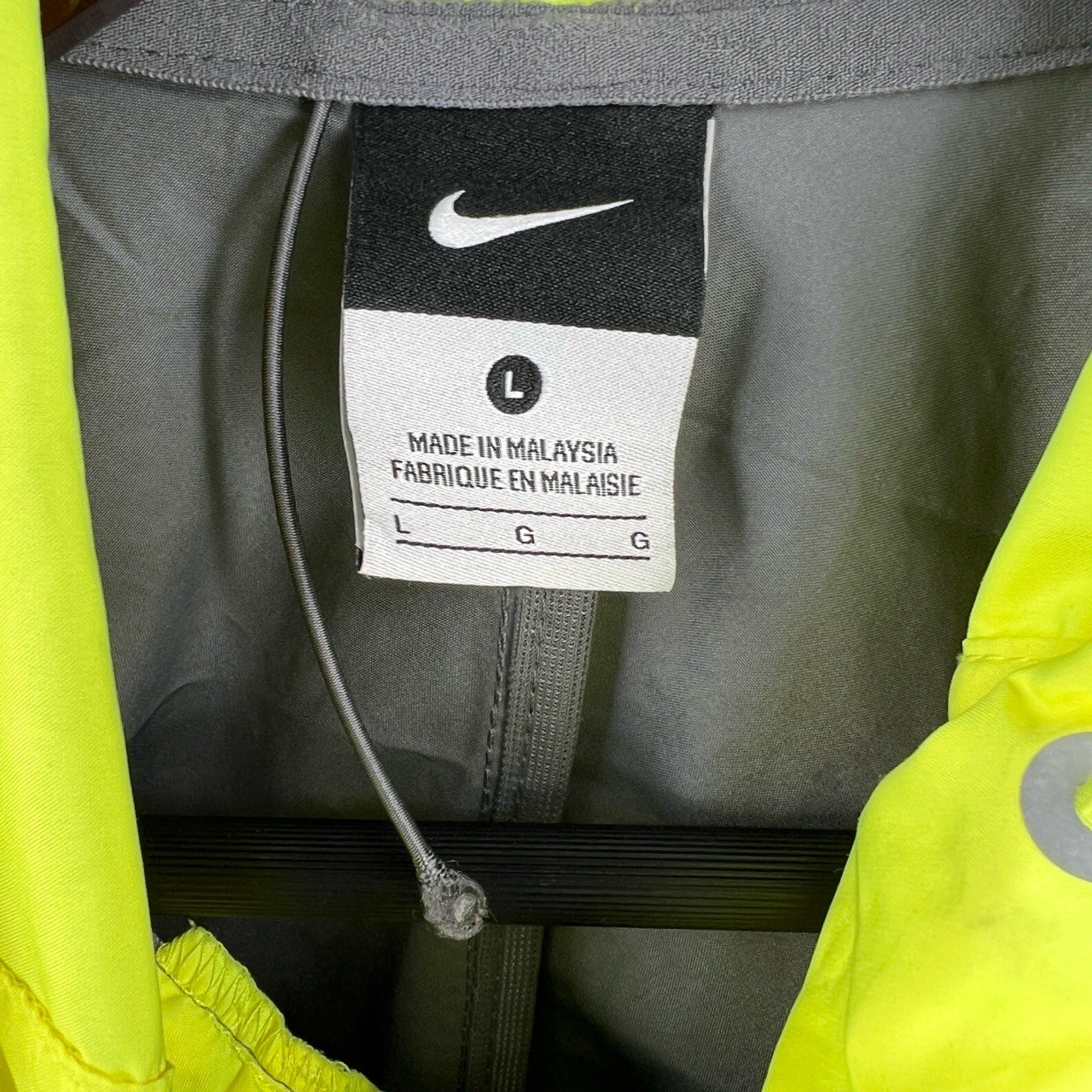 SACAI X NIKE Giacca leggera Nike grigia dettagli riflettenti giacca a vento con cappuccio zip grande